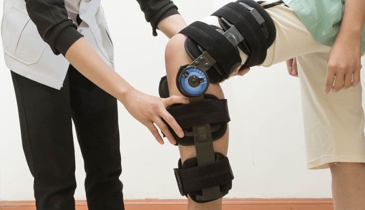 Patient receiving physiotherapy in their own home